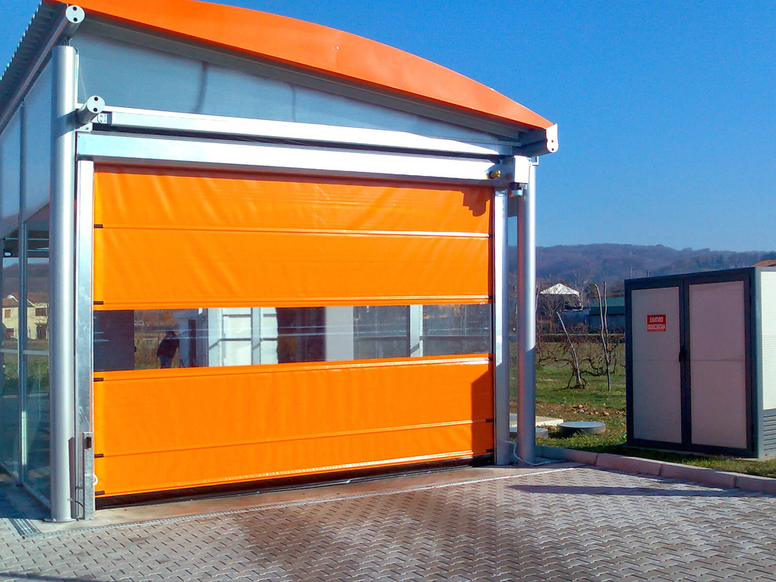 Porta rapida ad avvolgimento SAETTA - Arancio RAL 2004